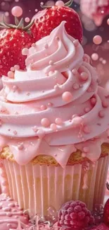 Strawberry cupcake with pink icing and berries.