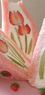 Artistic floral dessert with strawberries on a plate.