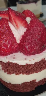 Red velvet cake with strawberries on top.