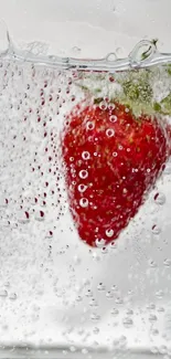 Close-up of a strawberry with water bubbles on a mobile wallpaper.