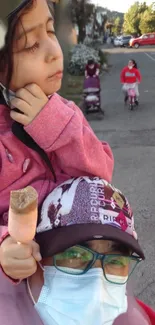 Child enjoying ice cream in a street scene with vibrant colors and warm ambiance.