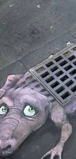 Street art creature emerging from a drain, vibrant and quirky.