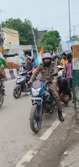 Motorbikers in uniforms with flags on city street.