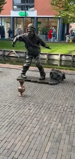 Dynamic street performer sculpture by the canal.