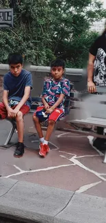 Street scene with family on stone bench.