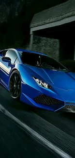 Blue luxury supercar on a road, showcasing speed and elegance.