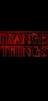 Neon red 'Stranger Things' logo on a black background.