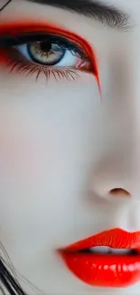 Close-up portrait with bold red makeup and striking eye detail.