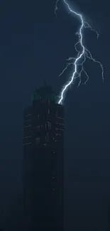 Lightning strikes a dark tower at night.