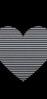 Minimalistic heart with black and white stripes on a black background.