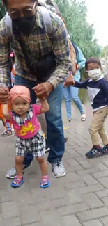 A joyful family moment in the park with children.