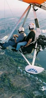 Ultralight aircraft gliding over scenic landscape.