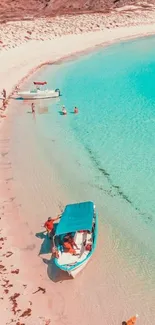 Aerial view of a pristine beach with turquoise waters and moored boats.