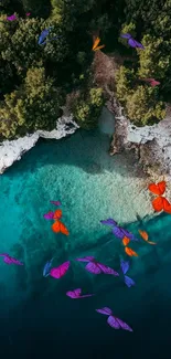 Aerial view of turquoise waters meeting lush green coastline.