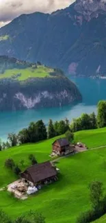 Beautiful alpine lake and mountain with vibrant green hills.