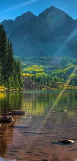 Serene view of an alpine lake and mountains under blue sky.