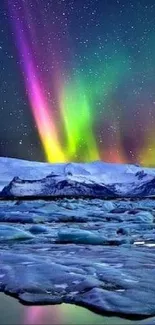 Aurora borealis over icy landscape under a starry night sky.