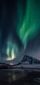 Northern Lights over snowy mountain with green auroras.