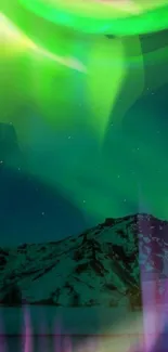 Mobile wallpaper featuring aurora borealis with green lights over snowy mountains.