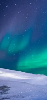 Aurora Borealis lights up the night sky over snow-covered hills.