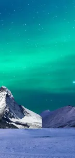 Snowy mountain under teal aurora sky.