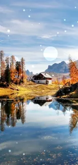 Autumn lake with golden trees and mountain reflection under a blue sky.