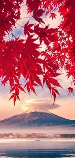 Red autumn leaves with mountain backdrop, mobile wallpaper.