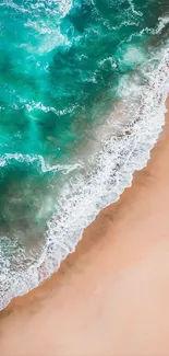 Aerial view of a pristine beach with turquoise waves.