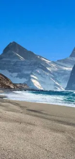 Beach and mountain landscape with clear blue sky