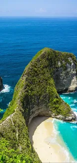 Cliffside beach with vibrant blue ocean and lush greenery.