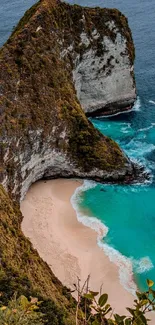 A stunning view of a beach with cliffs and turquoise ocean water.