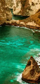 Tropical beach with turquoise waters and cliffs mobile wallpaper.