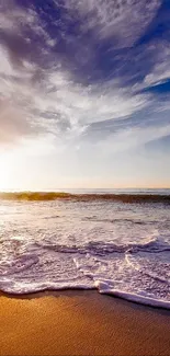 Serene beach scene with sunrise and calm ocean waves.