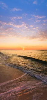 Serene sunset over ocean with waves and vibrant sky.