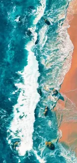 Aerial view of turquoise beach waves crashing on shore.