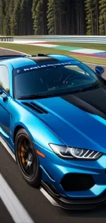 Blue sports car on racetrack wallpaper.