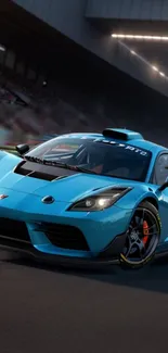 Blue sports car on race track with blurred background.