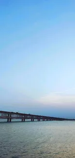 Scenic view of bridge over river with sunrise sky.