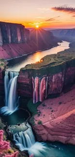 Breathtaking sunset over a canyon with vibrant waterfalls and colorful cliffs.