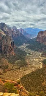 Stunning canyon view with rocky cliffs and winding river wallpaper.