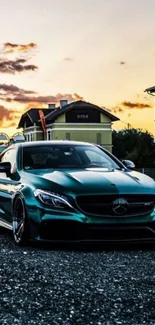 Sleek teal car parked during sunset in urban setting.