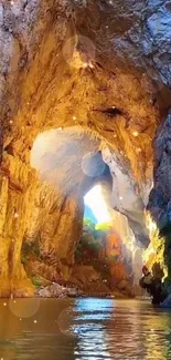 Golden cave waterfall with sunlight streaming through, creating a mesmerizing view.