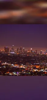 Purple night sky over a vibrant cityscape.