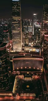 A stunning city nightscape with illuminated skyscrapers and bustling urban lights.