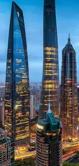 City skyline with illuminated skyscrapers at twilight, showcasing modern architecture.