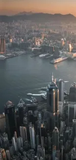 Cityscape wallpaper at dusk with skyline and serene waters in the background.