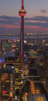 City skyline at night with vibrant urban lights and skyscrapers.