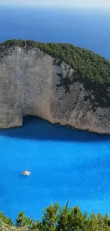 Bright blue sea against rocky coastal cliffs in a stunning natural setting.