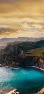 Stunning cliffside view with blue ocean under a golden sky.