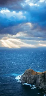 Lighthouse on a cliff under dramatic sky over the ocean.